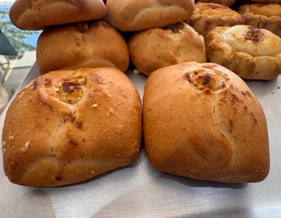 Cinnamon sugar sweet cheese buns, traditional Cretan cakes, Bakery Kissamos
